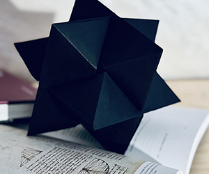 Geometric Shadows and Origami Symmetry - Polyhedra Origami